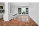 Modern kitchen features a breakfast bar and views to courtyard at 800 S Blvd Of Presidents # 12, Sarasota, FL 34236