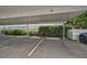 Covered parking with designated spaces at 800 S Blvd Of Presidents # 12, Sarasota, FL 34236