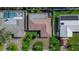 Overhead view of a home's roof, showcasing its layout and surrounding landscaping at 829 Harbor S Dr, Venice, FL 34285