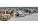 Aerial view of beachfront property, showcasing the building and surrounding area at 829 Harbor S Dr, Venice, FL 34285