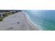 Aerial view of beach, ocean, and shoreline buildings at 829 Harbor S Dr, Venice, FL 34285