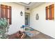 Inviting front entry with teal door and coastal decor at 829 Harbor S Dr, Venice, FL 34285