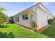 White house exterior with well-maintained landscaping at 829 Harbor S Dr, Venice, FL 34285