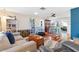 Open living space with hardwood floors, ample natural light, and a cozy atmosphere at 829 Harbor S Dr, Venice, FL 34285