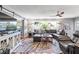 Open living area with hardwood floors, sectional sofa, and stylish decor at 829 Harbor S Dr, Venice, FL 34285