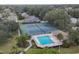 Community pool and tennis courts offer resort-style living at 8469 Cypress Lake Cir, Sarasota, FL 34243