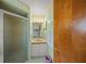 Clean bathroom with shower/tub combo and a vanity at 8469 Cypress Lake Cir, Sarasota, FL 34243