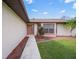 Inviting front entrance with a walkway leading to the front door at 8469 Cypress Lake Cir, Sarasota, FL 34243