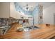 Bright kitchen with wood laminate countertops and stainless steel sink at 8469 Cypress Lake Cir, Sarasota, FL 34243