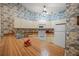 Kitchen features wood countertops and white appliances at 8469 Cypress Lake Cir, Sarasota, FL 34243