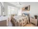 Bright bedroom with tiled floors and window seat at 866 Hudson Ave # 866, Sarasota, FL 34236