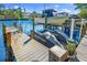 Community boat dock featuring multiple boat slips at 866 Hudson Ave # 866, Sarasota, FL 34236
