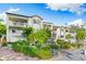Two-story building with lush landscaping and balconies at 866 Hudson Ave # 866, Sarasota, FL 34236