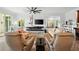 Relaxing living room with a fireplace and comfortable seating at 866 Hudson Ave # 866, Sarasota, FL 34236