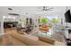 Spacious living room with comfortable seating and large windows at 866 Hudson Ave # 866, Sarasota, FL 34236