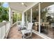 Relaxing patio with glass doors and comfortable seating at 866 Hudson Ave # 866, Sarasota, FL 34236