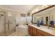 Elegant bathroom with a double vanity, soaking tub, and shower at 872 Clear Lake Dr, Englewood, FL 34223