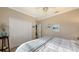 Bedroom with a king bed, coastal decor, and a double door closet at 872 Clear Lake Dr, Englewood, FL 34223