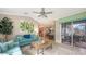 Open living space with view into dining area and backyard at 872 Clear Lake Dr, Englewood, FL 34223