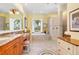 Elegant bathroom with a large soaking tub and double vanity at 8808 Enclave Ct, Sarasota, FL 34238