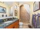 Charming bathroom with granite vanity and tiled shower at 8808 Enclave Ct, Sarasota, FL 34238