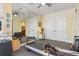 Serene bedroom with pilates machine and large mirror at 8808 Enclave Ct, Sarasota, FL 34238