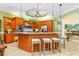 Spacious kitchen with island and stainless steel appliances at 8808 Enclave Ct, Sarasota, FL 34238