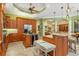 Large kitchen with double island and wood cabinets at 8808 Enclave Ct, Sarasota, FL 34238