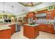 Kitchen with island and stainless steel appliances at 8808 Enclave Ct, Sarasota, FL 34238
