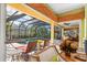 Relaxing pool and spa area with covered patio at 8808 Enclave Ct, Sarasota, FL 34238