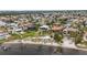 Aerial view of waterfront homes with private pools and lush landscaping at 103 Graham Se St, Port Charlotte, FL 33952