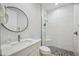 Modern bathroom with a shower, toilet, and vanity at 103 Graham Se St, Port Charlotte, FL 33952