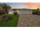 Beautiful waterfront home at sunset, showcasing its architecture at 103 Graham Se St, Port Charlotte, FL 33952