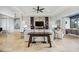 Open concept living space with cozy seating and large TV at 103 Graham Se St, Port Charlotte, FL 33952