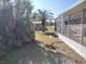 Spacious backyard with a screened patio and shed at 114 Wilmers Rd, Punta Gorda, FL 33982