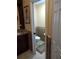 Convenient half bathroom with toilet and sink at 114 Wilmers Rd, Punta Gorda, FL 33982