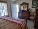 Comfortable bedroom with a dresser and large bed at 114 Wilmers Rd, Punta Gorda, FL 33982