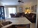 Comfortable living room with couches and a view into the kitchen at 114 Wilmers Rd, Punta Gorda, FL 33982