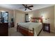 Bedroom with wooden bed frame and built-in closet at 1225 S View Dr, Sarasota, FL 34242