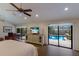 Main bedroom with pool access and plenty of natural light at 1225 S View Dr, Sarasota, FL 34242