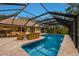 Inviting pool and patio with covered seating area at 1225 S View Dr, Sarasota, FL 34242