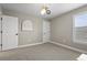 Spacious bedroom featuring neutral walls, a large window, and plenty of natural light at 12409 Wigeon Dr, Bradenton, FL 34212