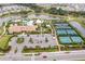 Resort-style community amenities including pools, tennis courts, and clubhouse at 12410 Osorio Ct # 103, Sarasota, FL 34238