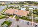 Luxury clubhouse with pool and parking area in a gated community at 12410 Osorio Ct # 103, Sarasota, FL 34238