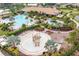 Resort-style pool with multiple pools, a playground, and expansive deck at 12410 Osorio Ct # 103, Sarasota, FL 34238