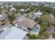 Aerial view showcasing the home's location, backyard pool, and surrounding neighborhood at 127 Crescent Dr, Anna Maria, FL 34216