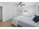 Bright bedroom featuring light wood floors and a clean design at 127 Crescent Dr, Anna Maria, FL 34216