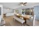 Bright dining room with sliding doors leading to a deck at 127 Crescent Dr, Anna Maria, FL 34216