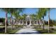 Community center with palm trees and a walkway at 13153 Steinhatchee Loop, Venice, FL 34293