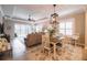 Casual dining area with a table and chairs near the kitchen and living room at 13153 Steinhatchee Loop, Venice, FL 34293